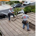 Dove Canyon Roof Repair 11 Roofers completing repairs on a tile roof